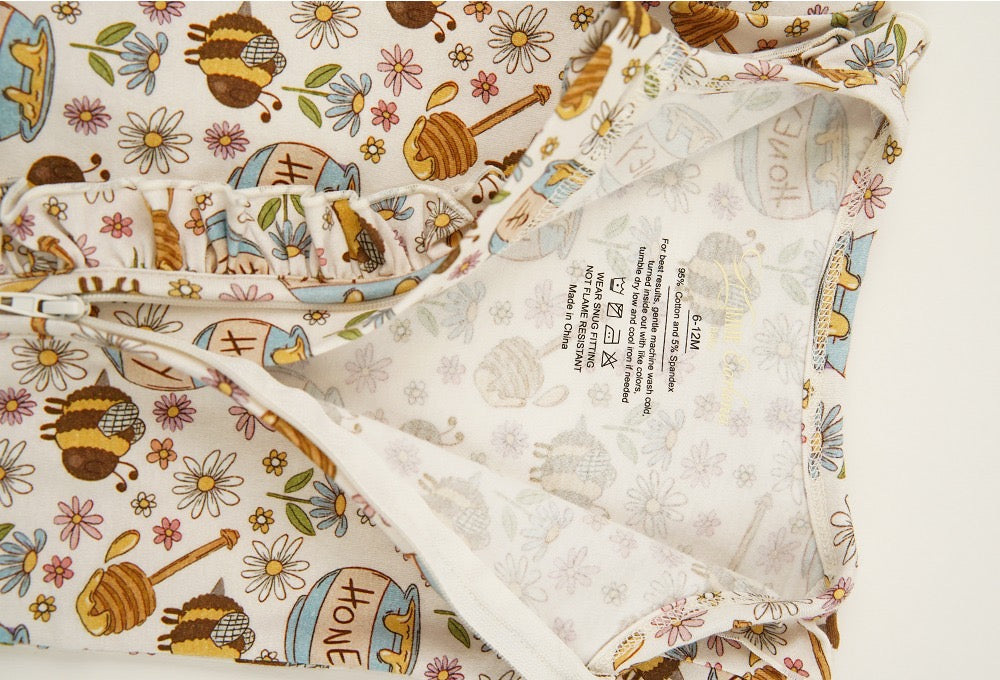 Bees print onesie